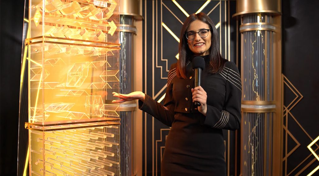 a fancy stage, a pachinko machine, and an entertaining host